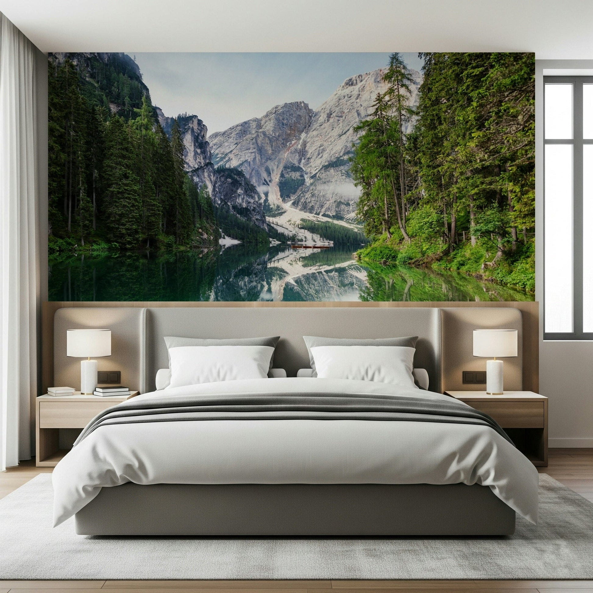 Behind the bed, Alpine Reflections Wall Mural creates a cool nature-led feature