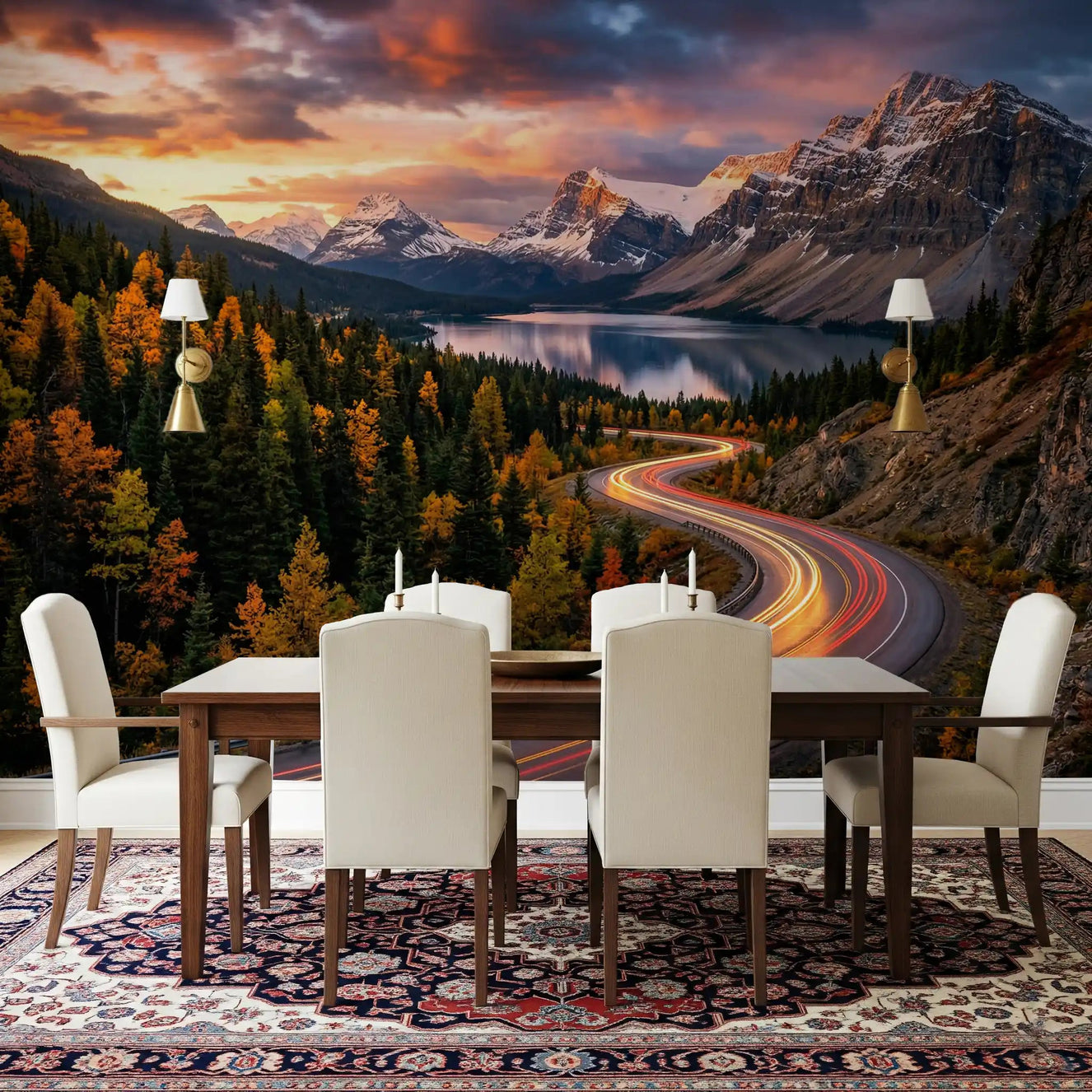 Sunset landscape wall mural with alpine cliffs, forest, and curving highway