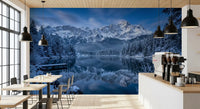 Blue alpine lake scene shown in Winter Reflection wall mural