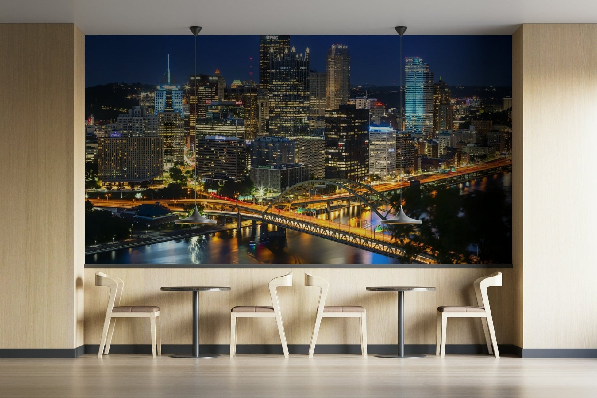 Evening Pittsburgh skyline mural with glowing bridges


