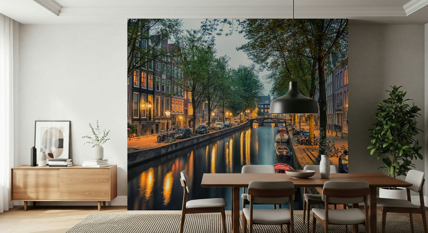 Amsterdam Canal Lights Wall Mural adds warm urban calm to this dining area by the window
