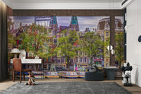 A peaceful wall mural with a view of a canal in Amsterdam.

