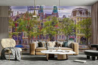 The canal houses are tall and have classic Dutch architecture.

