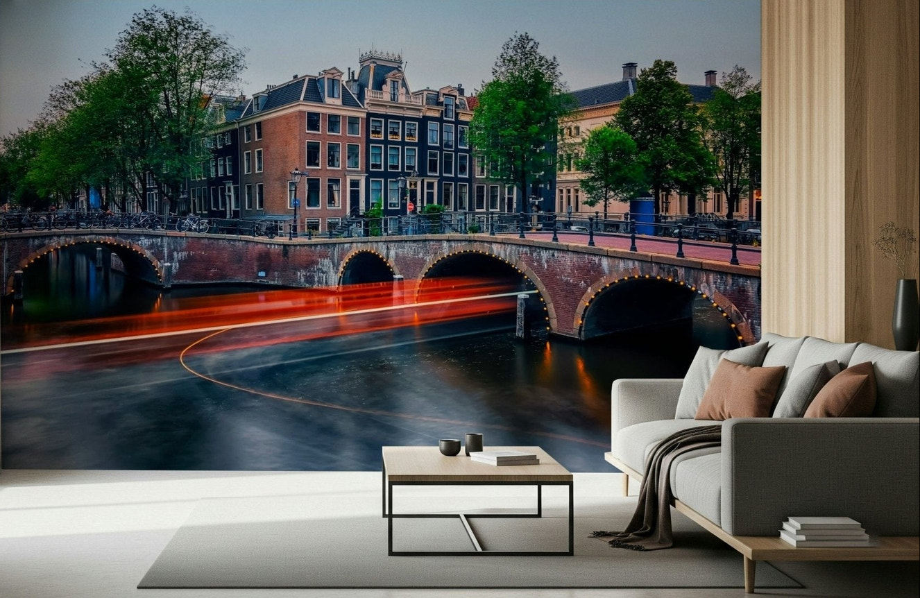 A relaxed lounge styled with Amsterdam Lights Wall Mural and glowing canal curves