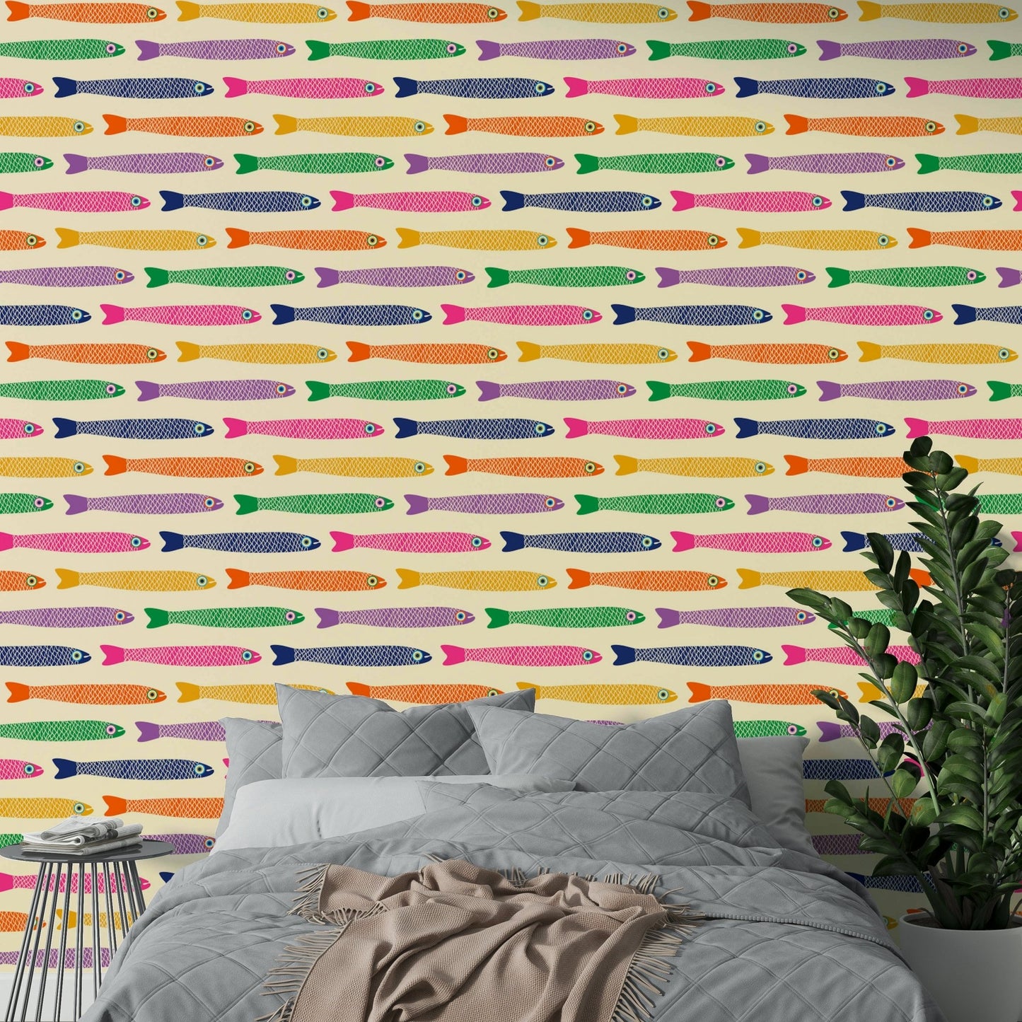 Colorful anchovies fish pattern on cream wallpaper design

