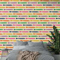 Colorful anchovies fish pattern on cream wallpaper design


