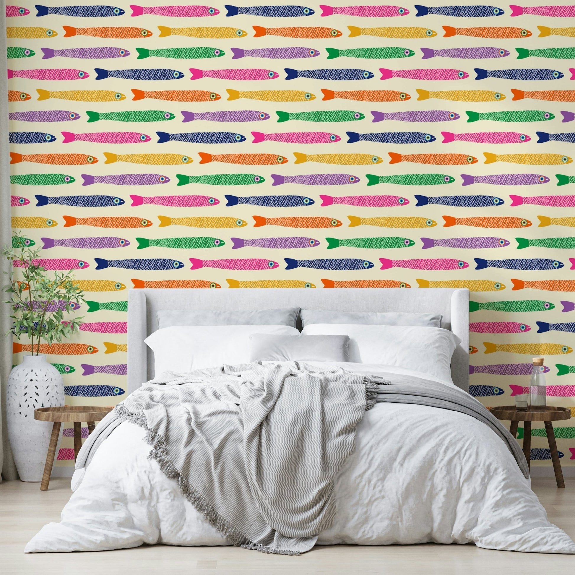 Anchovies bright rainbow fish on cream wallpaper design

