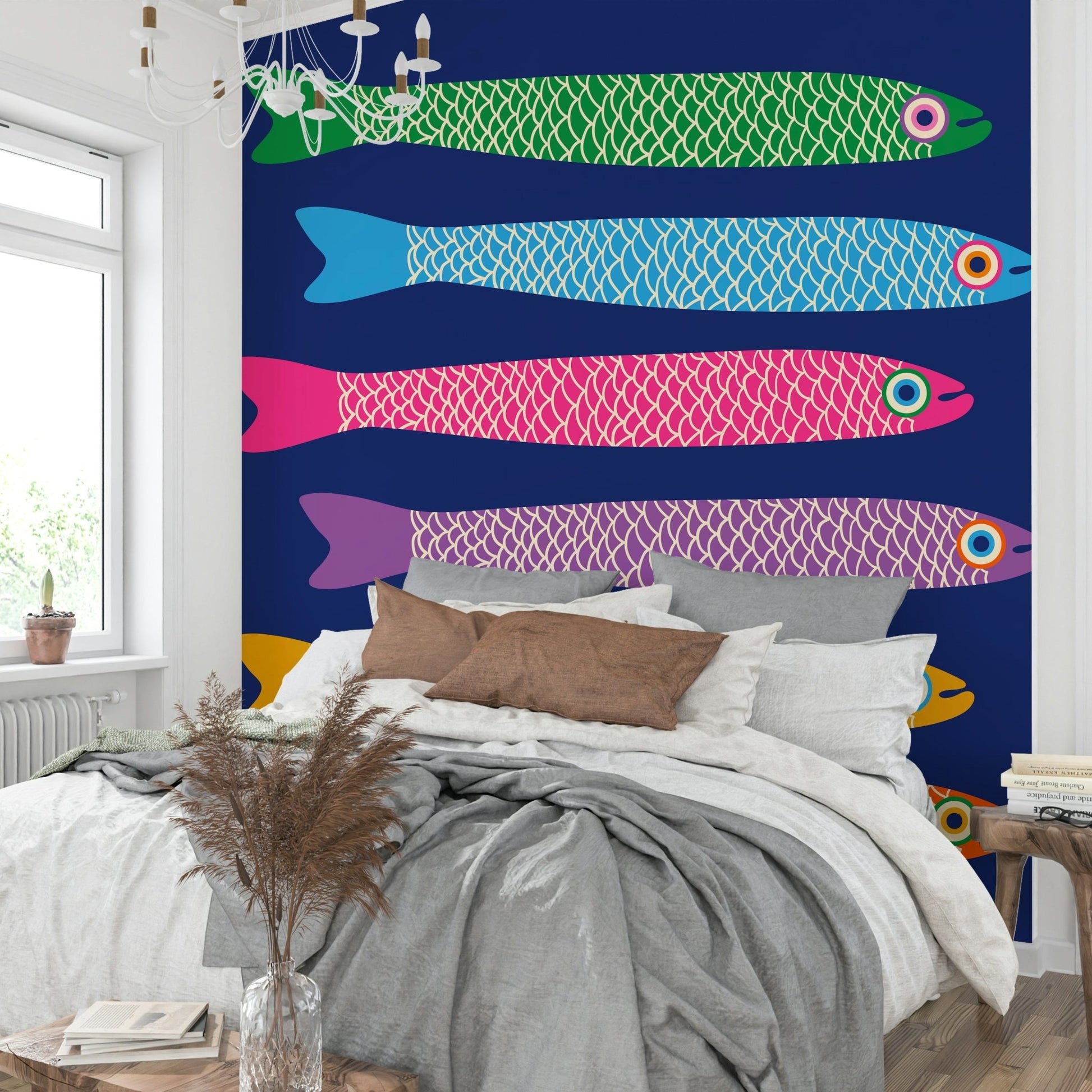 Colorful fish on a royal blue wall decoration.

