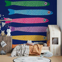 Royal blue wall with rainbow-colored anchovies.

