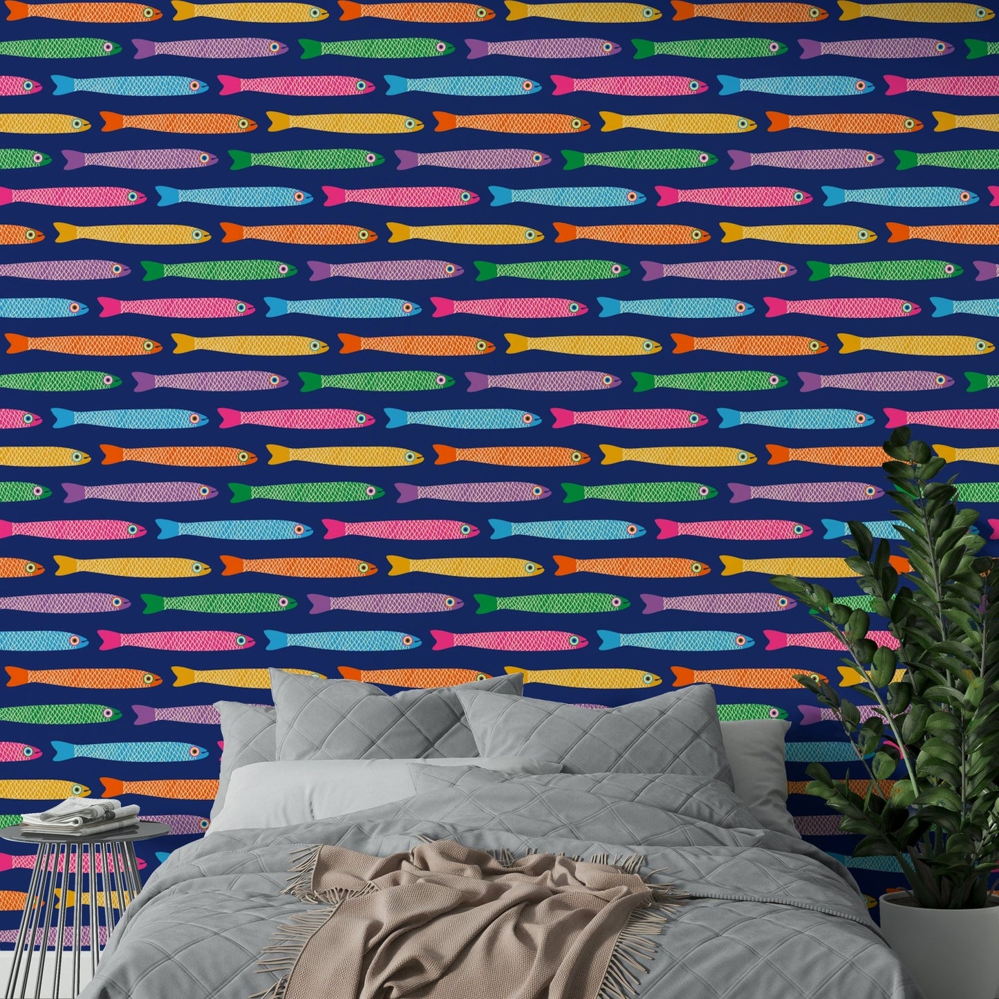Anchovies in rainbow colors on a royal blue wallpaper design

