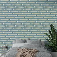 Playful wallpaper with cream and green fish

