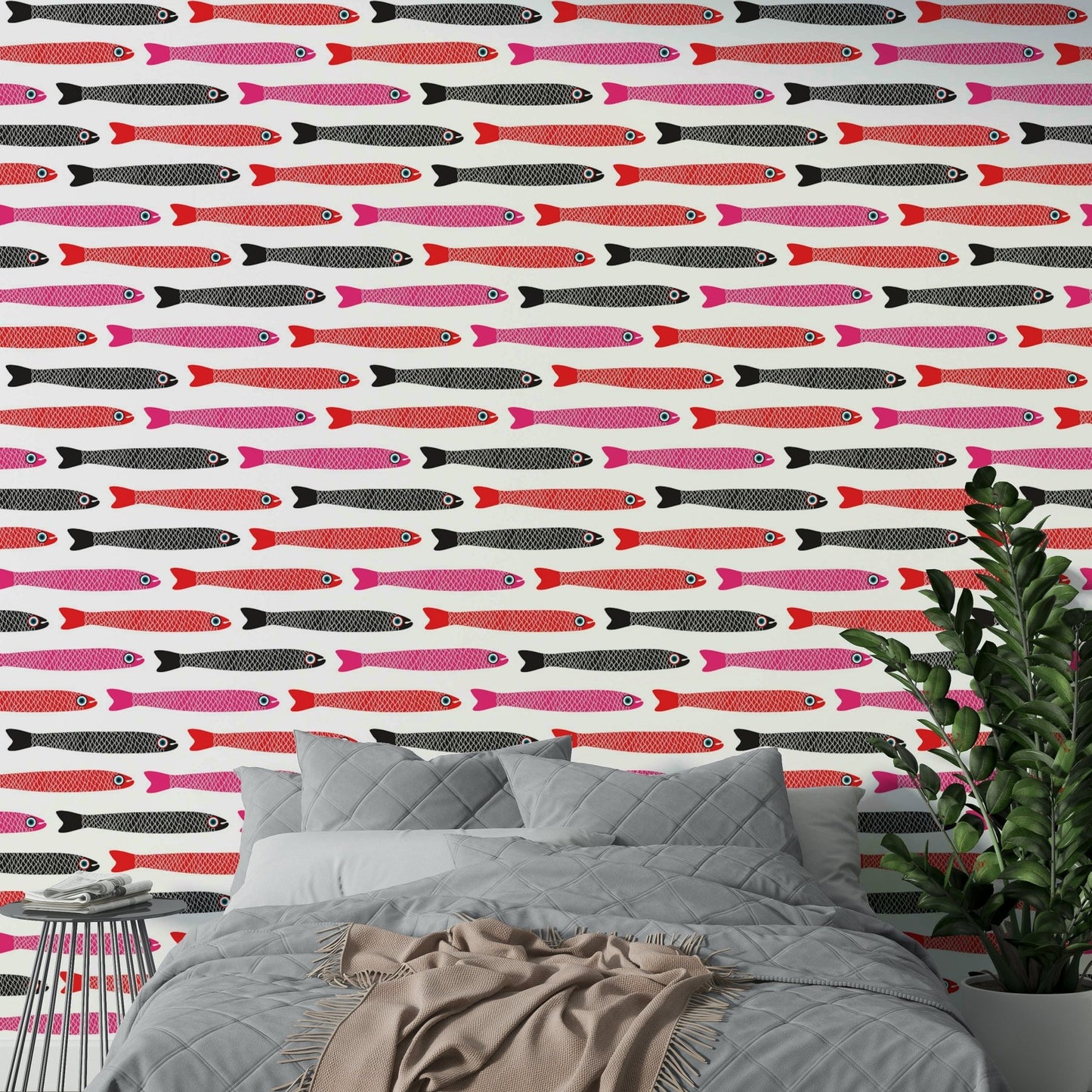 Red pink black fish on white wall
