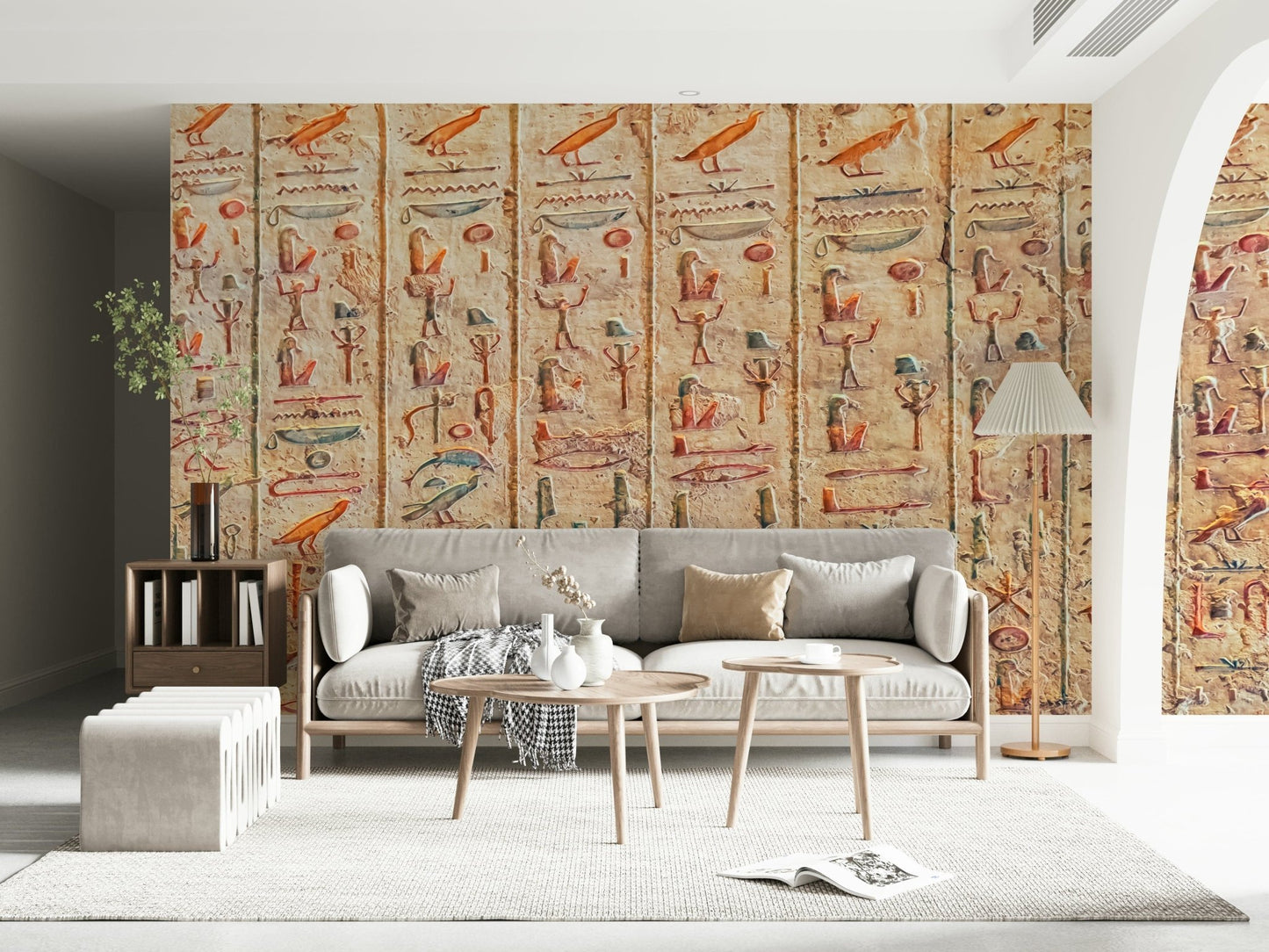 Ancient Glyphs Wall Mural gives this sitting area a weathered heritage wall backdrop