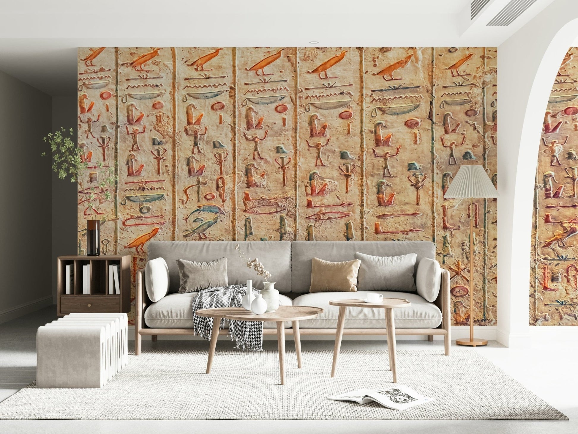 Ancient Glyphs Wall Mural gives this sitting area a weathered heritage wall backdrop