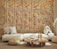 A warm lounge styled with Ancient Glyphs Wall Mural and carved stone-style markings