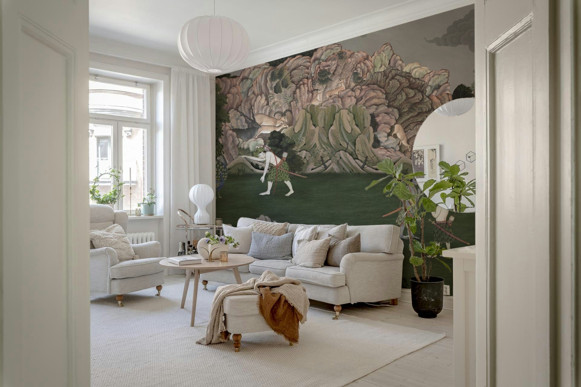 Scenic wall mural inspired by classical landscape art with mountains, trees, and tents