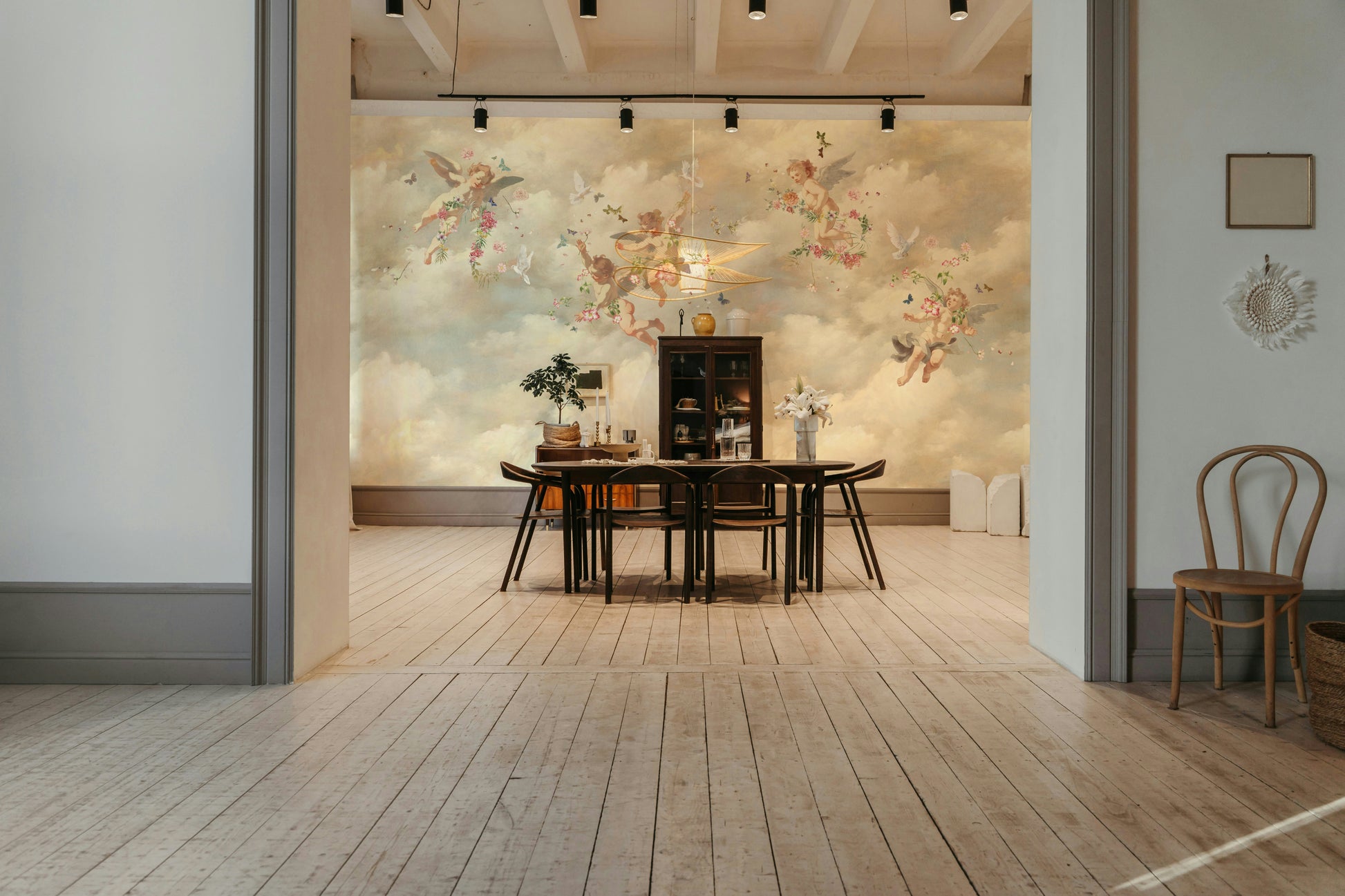 The colors are a mix of soft pastels, including light blue, pink, and white.

