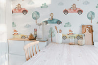 Whimsical animal racers wallpaper for kids' bedrooms
