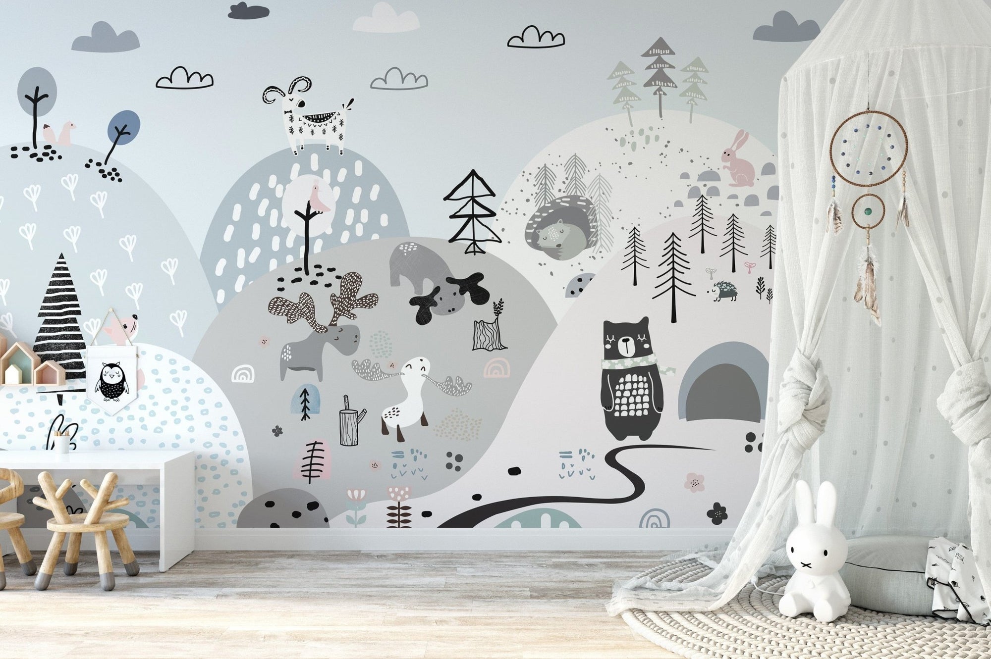 Playful forest animals wallpaper on scenic hilly backdrop A791