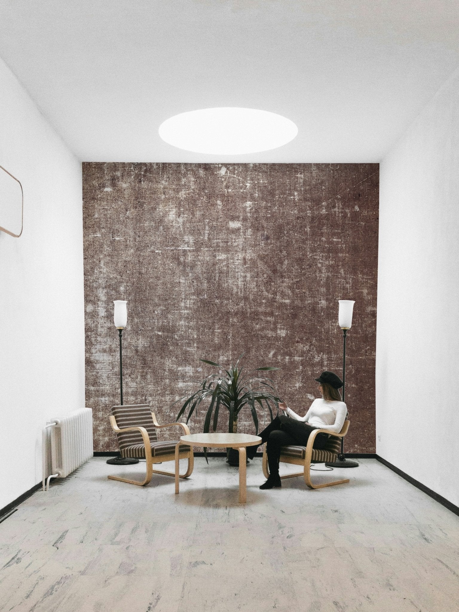 Rustic mural wallpaper with worn effect
