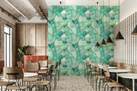 Flowing aqua and gold veins Aqua Gold Marble Wallpaper accenting a hallway.