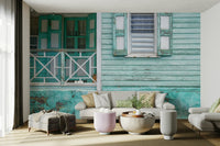 Aqua-colored mural of retro building exterior

