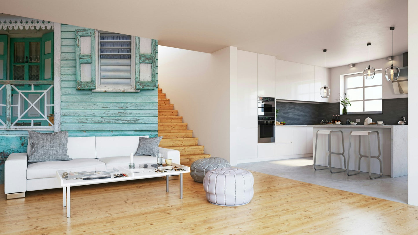 Weathered building facade in aqua tones

