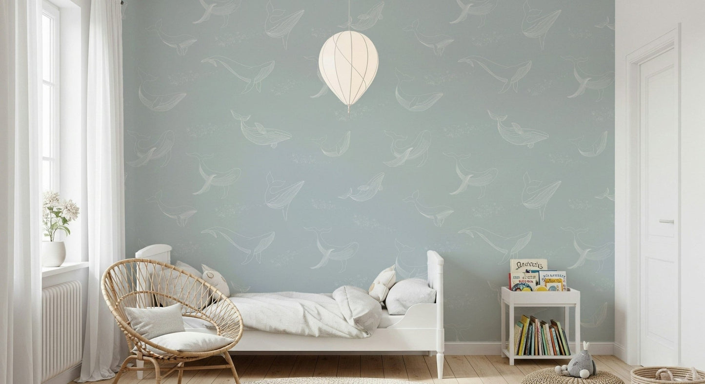 Minimalist living space featuring a blue Aqua Whale Dreams wallpaper.