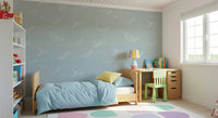 Aqua Whale Dreams wall mural with soft teal tones in a lounge.