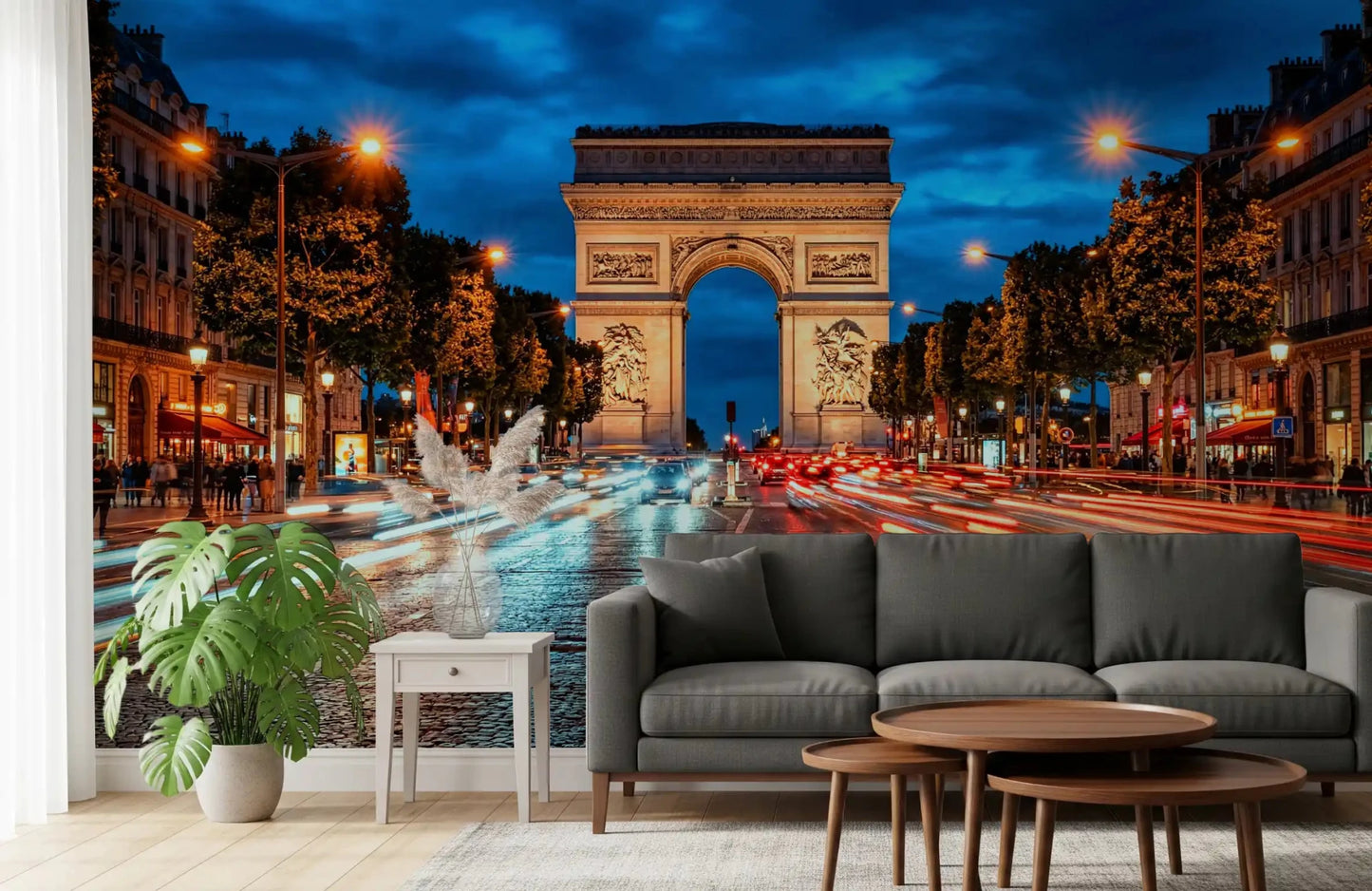 Arc de Triomphe wall mural with bright boulevard lights and blue sky