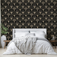 Black wallpaper with metallic gold fan design

