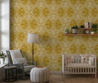 Vintage art nouveau wallpaper with butterfly motifs over a mustard gold base