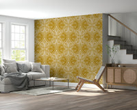 Honey-toned butterfly wallpaper with floral curls on art nouveau mustard gold tone