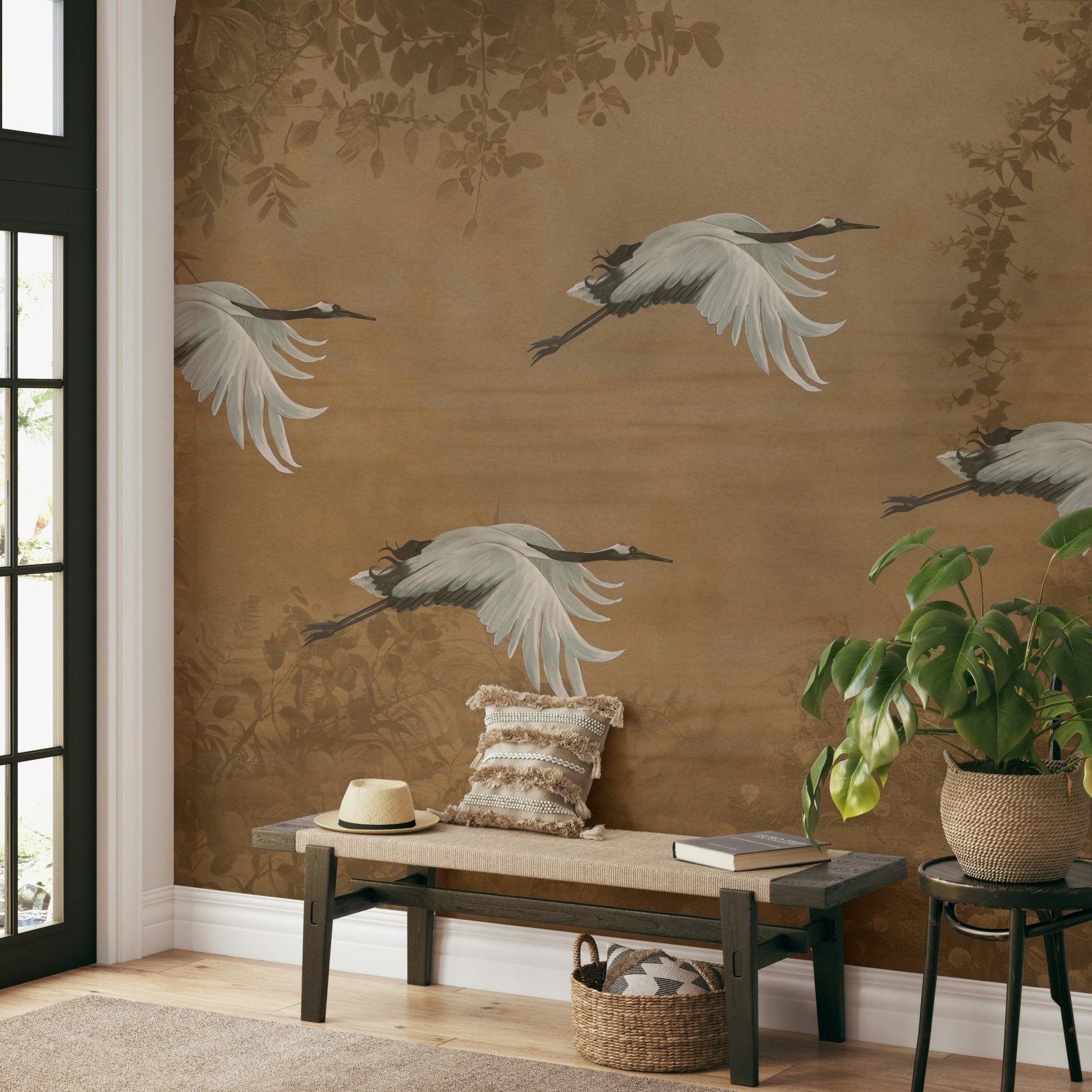 Birds are perched on branches with delicate, pink flowers.

