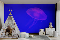 A graceful subtle sea creature wall mural in cool tones.


