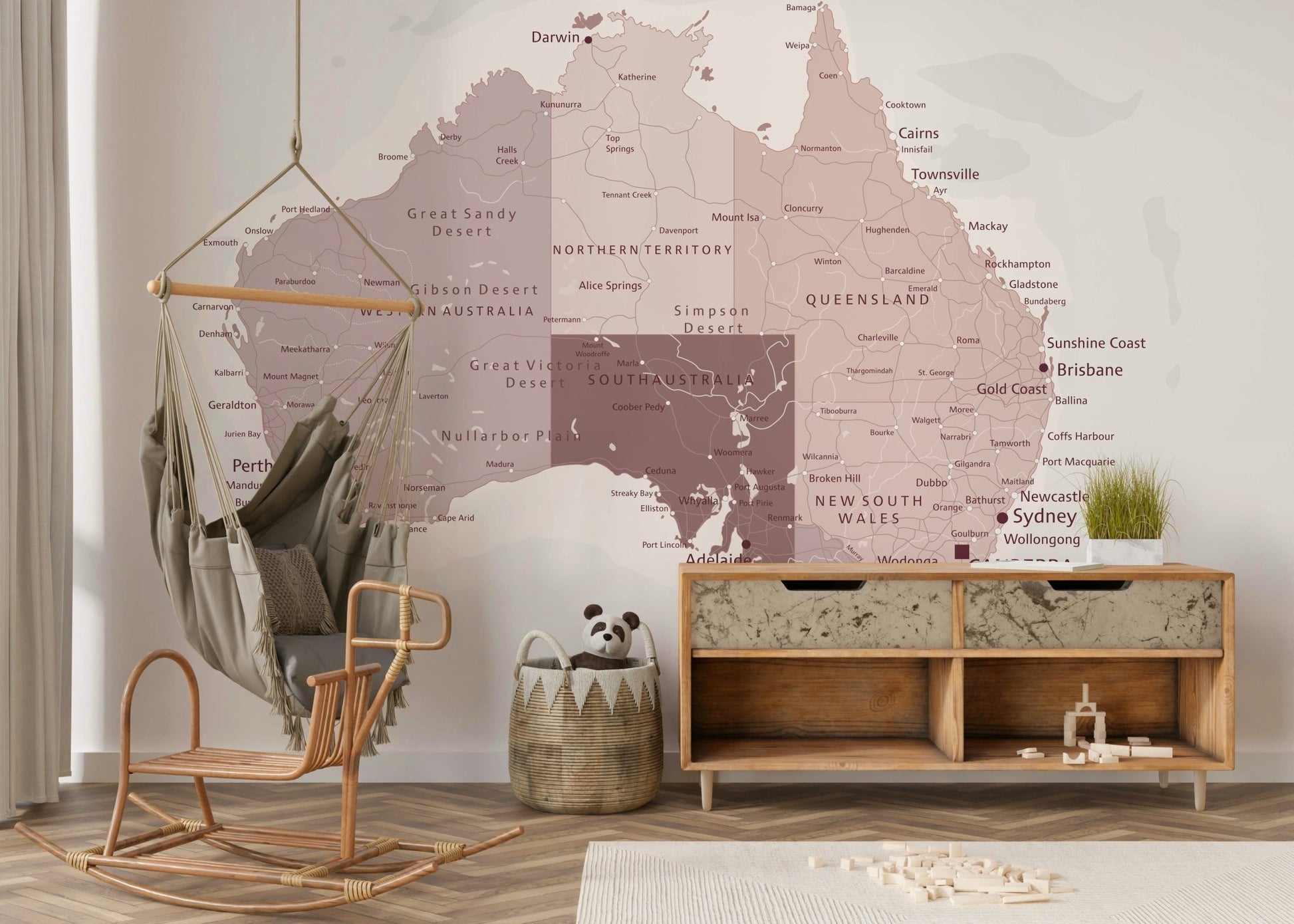 The colors are soft, muted tones of pink, purple, and gold.

