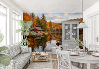 A red wooden cabin sits beside the lake in Autumn Lakeside Dream wall mural.GD9540