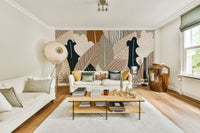 The ground is covered with fallen leaves.

