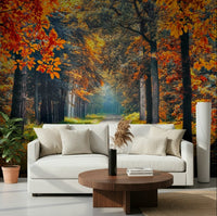 Autumn Path Wall Mural gives this lounge a warm forest trail backdrop with fall color