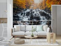 Autumn Waterfall wall mural with red maple leaves in a living room wallpaper