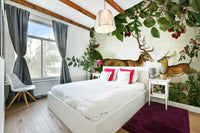 Botanical mural in rich red, orange, and brown hues

