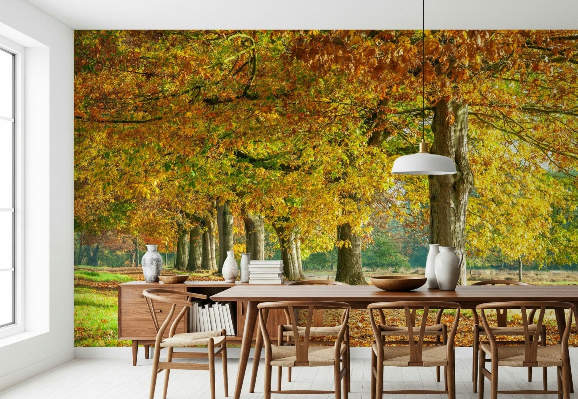 Golden autumn scene mural used as a backdrop for a minimalist lounge furniture set.
