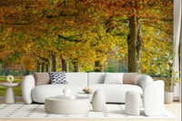 Nature style wall covering for a guest room with neutral accents and wooden flooring.