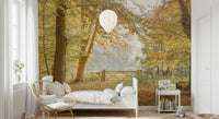 Nature inspired wall mural depicting a peaceful autumn trail in a home office.