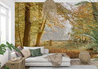 Artistic woodland wall mural creating depth in a small apartment lounge.