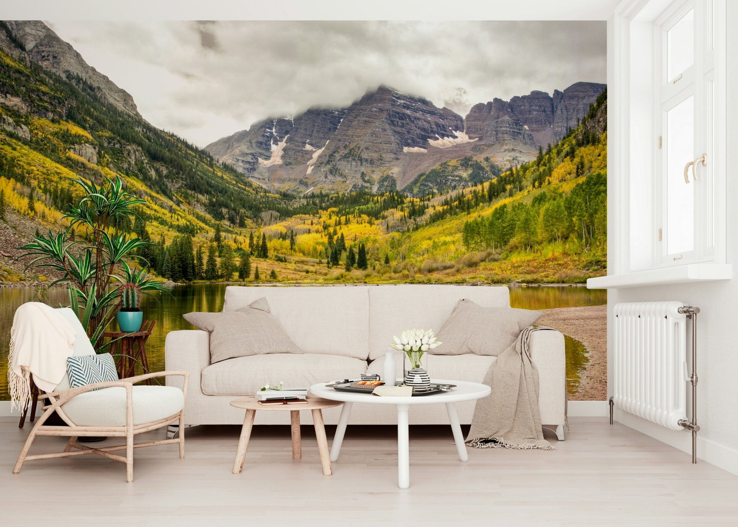 Scenic landscape wallpaper featuring snow-capped peaks and autumn foliage.