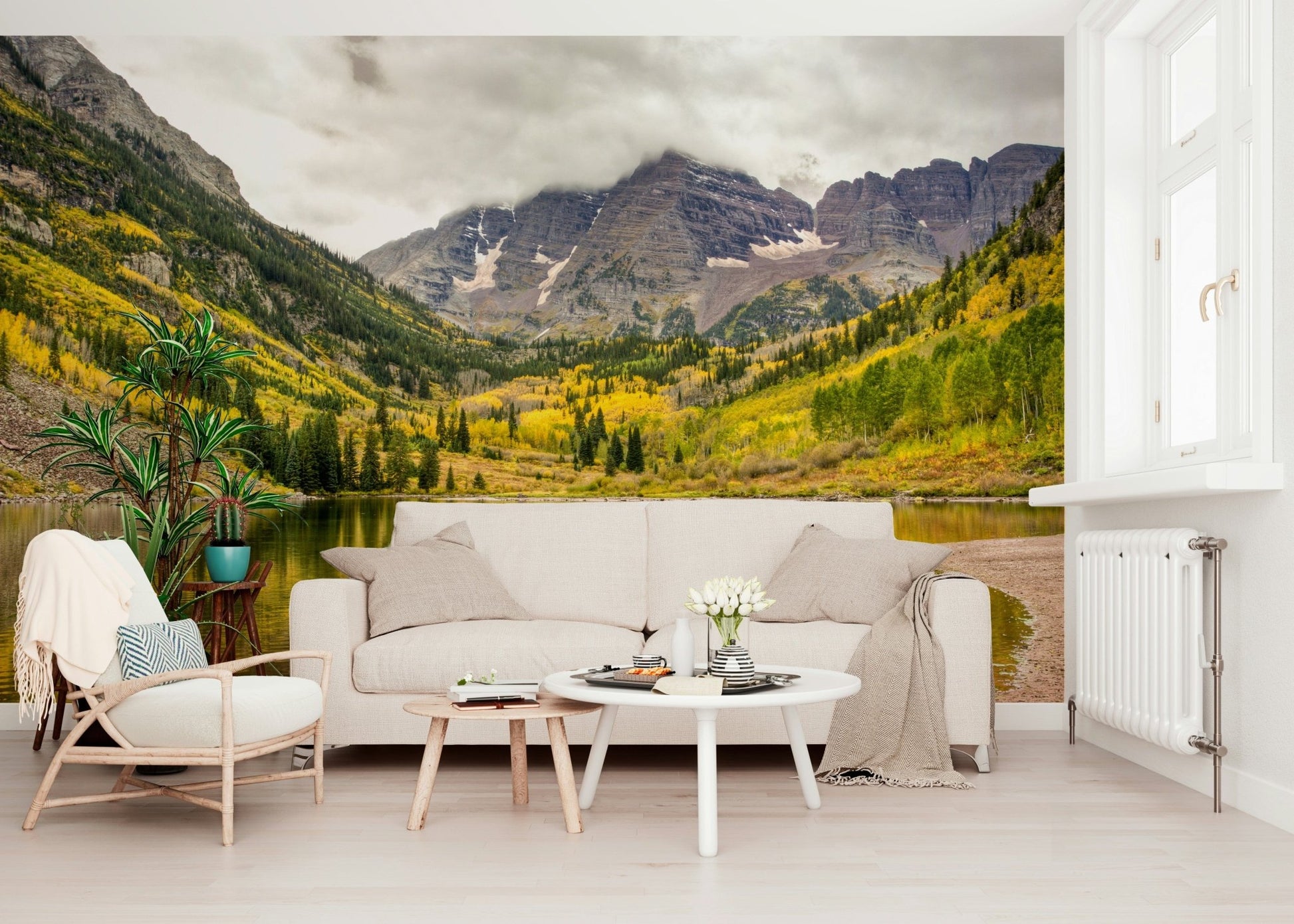 Scenic landscape wallpaper featuring snow-capped peaks and autumn foliage.