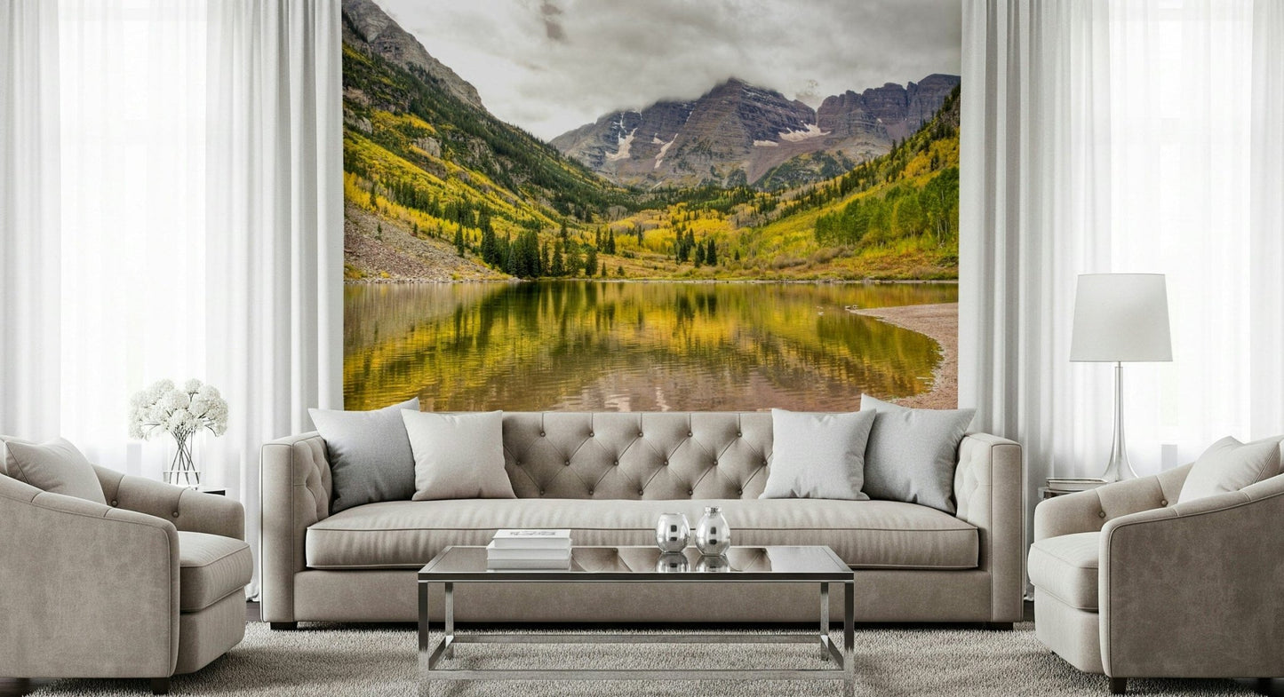 Majestic peak wall mural with a foreground of bright orange autumn leaves.