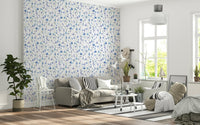 Minimalist home office featuring blue garden theme wallpaper on a single feature wall.