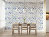 Elegant garden mural with blue blossoms in a spacious hallway with marble flooring.